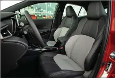  ??  ?? Features on the Corolla include: radar cruise, lane departure alert, heated seats, Bluetooth, Apple CarPlay, heated steering wheel, push-button start, backup camera, blind spot monitoring, automatic lights, and automatic climate control.