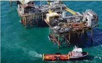  ?? Gerald Herbert / Associated Press file ?? A fire on Nov. 16, 2012, on a Black Elk Energy oil platform off the coast of Louisiana killed three workers.