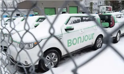  ?? PAUL CHIASSON/THE CANADIAN PRESS ?? Rows of parked taxis are seen in a Teo Taxi parking lot in Montreal in January. The company, which sought to take on Uber with a fleet of electric vehicles, has halted operations and laid off all its drivers after a few years of relying on government subsidies.