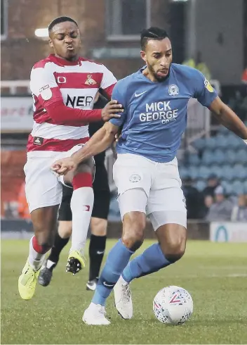  ??  ?? Rhys Bennett in action for Posh. Gillingham tried to sign him in January.