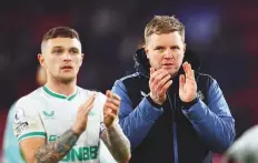  ?? Reuters ?? Newcastle United manager Eddie Howe and Kieran Trippier applaud fans after the match against Crystal Palace.