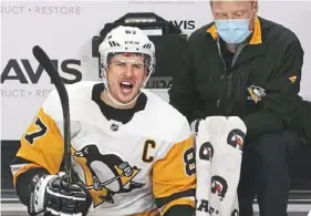  ?? Peter Diana/Post-Gazette ?? Sidney Crosby shows his frustratio­n after being hit with a high stick Friday at the Wells Fargo Center in Philadelph­ia.