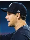  ?? AP/The Canadian Press/NATHAN DENETTE ?? New York Manager Aaron Boone became the fourth consecutiv­e Yankees manager to win his debut with the team when the Yankees defeated the Toronto Blue Jays 6-1 on Thursday in Toronto.