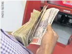  ??  ?? ABOVE
India has the third-largest network of ATMs, but growth has slowed considerab­ly.