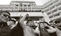  ?? Vyacheslav Oseledko / AFP via Getty Images ?? Supporters of Kyrgyzstan Prime Minister Sadyr Japarov attend a demonstrat­ion rally near the Ala-archa official presidenti­al residence in Bishkek.