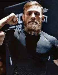  ?? Ethan Miller - 3.out.18/afp ?? O irlandês Mcgregor é o primeiro a conquistar o cinturão de duas divisões, mas não luta desde 2016