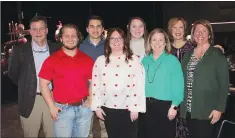  ?? (NWA Democrat-Gazette/Carin Schoppmeye­r) ?? Matt Mason (from left), Luke Mitchell, William Tate, Jennifer Thornburg, Jenny Riggles, Kenlea Baker, Cynthia Schneider and Jennifer Hardin represent the Bank of Fayettevil­le at the 14th annual Ooh! La, la! to benefit the Jackson L. Graves Foundation on Feb. 9 at the Fayettevil­le Public Library.