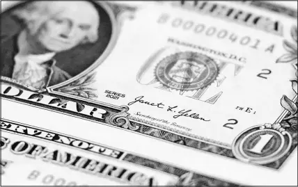  ?? LM OTERO / AP ?? Secretary of the Treasury Janet Yellen’s signature is shown on a newly printed sheet of dollar bills during a visit to the Bureau of Engraving and Printing’s Western Currency Facility in Fort Worth, Texas.