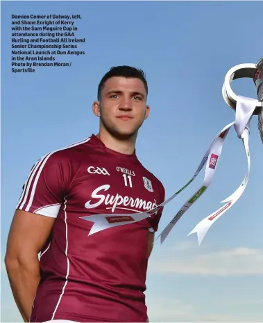  ??  ?? Damien Comer of Galway, left, and Shane Enright of Kerry with the Sam Maguire Cup in attendance during the GAA Hurling and Football All Ireland Senior Championsh­ip Series National Launch at Dun Aengus in the Aran Islands
Photo by Brendan Moran /...