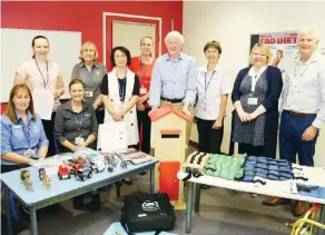  ??  ?? WGHG staff display some of the new equipment purchases from last year’s daffodil bulb proceeds. From left Sue Aberdeen, Nicole Robertson, Donna Ablett, Ros Herrera, Ulla Schmidt, Marja Jamieson, John Blyth from Blyth Bros., Elaine Coetzee, Audra Fenton...