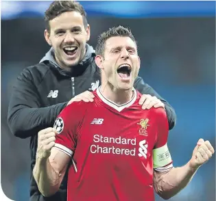  ??  ?? James M ilner and Danny Ward celebrate booking their Champions League semi-final spot in midweek