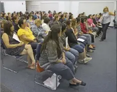  ?? IV PRESS FILE PHOTO ?? Instructor­s listen in to guest speaker Sharron Krull during a workshop at the Imperial County Office of Education in El Centro on October 2013.