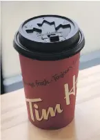  ??  ?? A new maple leaf lid is being tested at six locations. Alex Macedo, president of Tim Hortons at the Hockey Hall of Fame Tim Hortons location in Toronto.