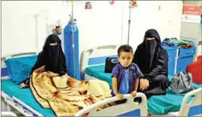  ?? AFP ?? A Yemeni youth (left) suffering from Thalassemi­a – a genetic blood disorder – receives treatment at the Yemen Society for Thalassemi­a and Genetic Blood Disorders (YSTH) in the capital Sanaa on Monday.