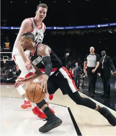  ?? STEVE DYKES / THE ASSOCIATED PRESS ?? Backup centre Jakob Poeltl could see more minutes with the Raptors as they play in a pair of high-altitude cities.