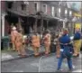  ?? PETE BANNAN – DIGITAL FIRST MEDIA ?? Coatesvill­e firefighte­rs work at a house fire in the 700 block of East Chestnut Street.