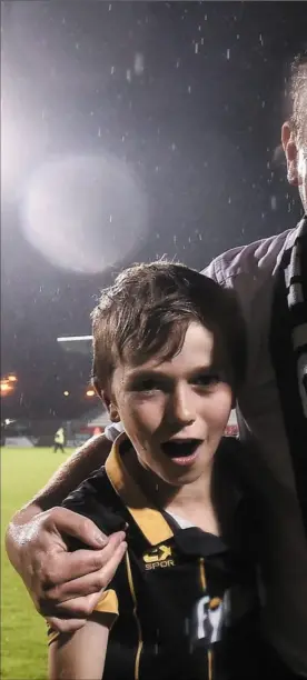  ??  ?? Dundalk manager Stephen Kenny with his two sons, Eoin, left, and Fionn.