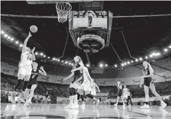  ?? [SARAH PHIPPS, THE OKLAHOMAN] ?? Roland's Racheal Watie goes up for a lay up during a Class 3A girls high school quarterfin­al basketball state championsh­ip tournament game between Roland and Valliant at the State Fair Arena in Oklahoma City, Wednesday, March 10, 2021.