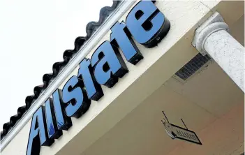  ?? GETTY IMAGES FILES ?? An Allstate insurance company sign is seen outside one of its stores in Miami, Fla.