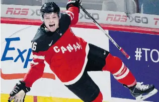  ?? RYAN REMIORZ/THE CANADIAN PRESS ?? Canada’s Max Domi celebrates a goal against the United States on Wednesday in Montreal.