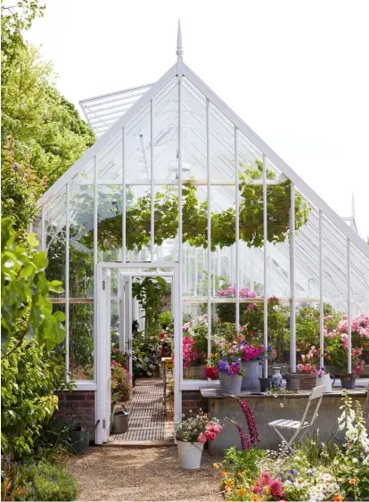  ??  ?? Left: Freestandi­ng bespoke Victorian-style aluminium greenhouse, £11,250, Alitex; Below: While some greenhouse­s have full-height glazing, many are built on dwarf walls. If built in the same material as the house, dwarf walls provide a way to unify the two structures. They can also offer a base for cold frames to further maximise your growing space