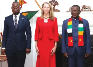  ?? — Picture: Believe Nyakudjara ?? President Mnangagwa, flanked by Foreign Affairs and Internatio­nal Trade Acting Minister Professor Amon Murwira, poses with the incoming Federal Republic of Austria’s Ambassador to Zimbabwe Mrs Romana Königsbrun after he received her credential­s at State House in Harare yesterday.