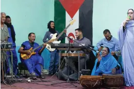  ?? ?? ‘At the beginning, it was work for the nation, organised by the nation’ … a performanc­e by El Wali in Laayoune refugee camp in 2023. Photograph: Andrea Prada Bianchi and Pesha Magid