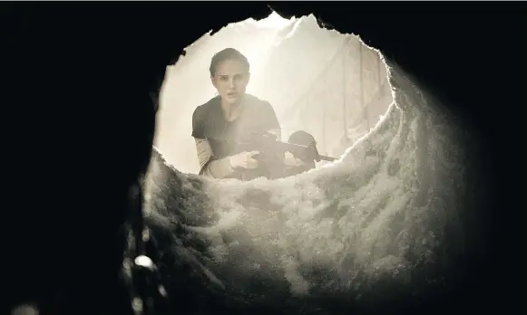  ?? PHOTOS: PARAMOUNT PICTURES ?? Actress Natalie Portman’s character stares into a literal — and metaphoric­al — abyss in Alex Garland’s new movie Annihilati­on.