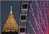  ?? JOHN SPINK / JSPINK@AJC.COM ?? See the skyline from about 20 stories above Centennial Park when you take a ride on the SkyView Ferris wheel.