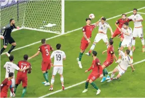  ?? AP ?? Mexico’s Hector Moreno (number 15) scores his side’s second goal during the Confederat­ions Cup Group A football match between Portugal and Mexico at the Kazan Arena, Russia, yesterday.