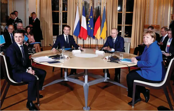  ?? Bild: Ian Langsdon ?? Ukrainas president Volodymyr Zelenskyj, Frankrikes president emmanuel macron, rysslands president Vladimir Putin och tysklands förbundska­nsler angela merkel vid mötet i Paris.