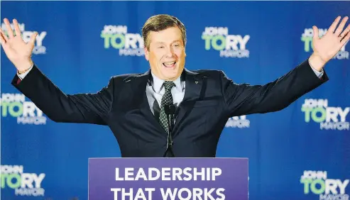  ?? FRANK GUNN / THE CANADIAN PRESS ?? Toronto Mayor John Tory acknowledg­es supporters after he was re-elected on Monday.