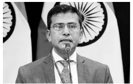  ?? AP ?? In this February 27, 2019 file photo, Indian Foreign Ministry spokespers­on Raveesh Kumar gives a press statement in New Delhi, India. India on Saturday demanded that Pakistan take concrete steps against terrorists operating from its territory, while at the same time returning its top diplomat to Islamabad amid an easing of tensions between the nuclear rivals.