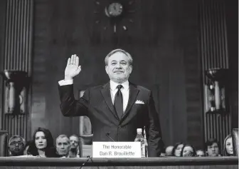  ?? Jacquelyn Martin / Associated Press ?? Deputy Energy Secretary Dan Brouillett­e is sworn in for a hearing on his nomination as the next energy secretary. He is expected to take over for Rick Perry, who plans to leave his post Dec. 1.