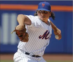  ?? FRANK FRANKLIN II - THE ASSOCIATED PRESS ?? New York Mets’ Jason Vargas delivers a pitch during the first inning of a baseball game against the Pittsburgh Pirates, Sunday, July 28, 2019, in New York.