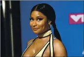  ?? EVAN AGOSTINI — INVISION/AP, FILE ?? Nicki MinZj ZppeZrs Zt the 2018 MTV Video Music AwZrds. She is expecting her first child.