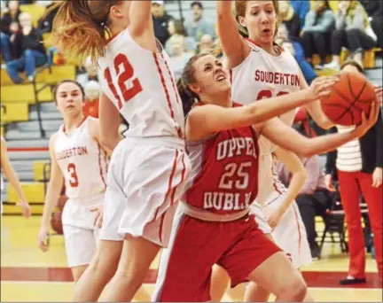  ?? SAM STEWART — DIGITAL FIRST MEDIA ?? Upper Dublin’s Maggie Weglos tries to get a shot to go in between two Souderton defenders.