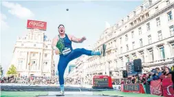  ?? JASPER JACOBS AFP/GETTY IMAGES ?? U.S. shot putter Ryan Crouser has taken to running hot water over the shots before taking them outdoors to practise in Doha, Qatar, so they won’t get slick from condensati­on.