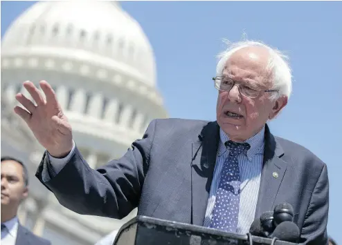  ?? ALEX EDELMAN / GETTY IMAGES FILES ?? A new report from the Mercatus Center says that Sen. Bernie Sanders’ Medicare for All would reduce total U.S. health expenditur­es by about US$2 trillion over a 10-year period.