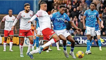  ?? Www.mphotograp­hic.co.uk ?? ●●Isaac Olaofe keeps the Walsall defence on their toes