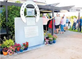  ?? Photo / Dean Taylor ?? Memorial to the Alexandra Racing Club and Pirongia Boxing Day Races, funded by a bequest from Molly Dawson who, with her brother JackMacky, bred the 1965 Melbourne Cup winner Light Fingers.