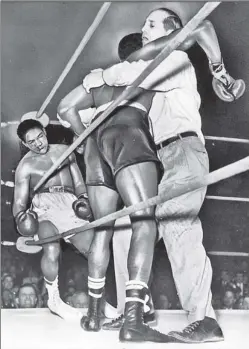  ?? AP ?? GARDEN TRAGEDY: Benny “Kid” Paret, slumped in the corner, later died of injuries inflicted in this 1962 Garden bout by Emile Griffith, who passed away Monday night at 75.