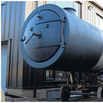  ?? TOM BRIGHT ?? Sitting in the winter sun, the boiler, smokebox and fifirebox from No. 90775 await their return to the locomotive’s frames for the hydraulic and steam tests. According to Keith Ashford: “An additional pair of mud hole doors have been cut into the upper...