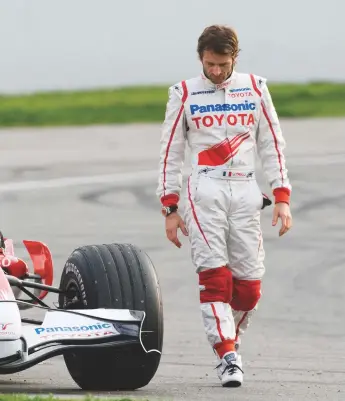  ??  ?? Above: Jarno Trulli during pre-season F1 testing at Barcelona in February 2008