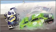  ?? AP/MIKE TROXELL ?? Chase Elliott (9), Kasey Kahne (95) and Danica Patrick (7) crash during the Daytona 500 on Sunday at Daytona Internatio­nal Speedway in Daytona Beach, Fla. None of the drivers finished the race.