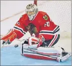  ??  ?? The Hawks’ Corey Crawford is strong technicall­y, and his instincts are underrated. | TOM CRUZE~SUN-TIMES