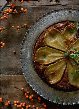  ??  ?? Syrupy pears and homemade custard transform this dish from cake into a moreish pudding, well earned