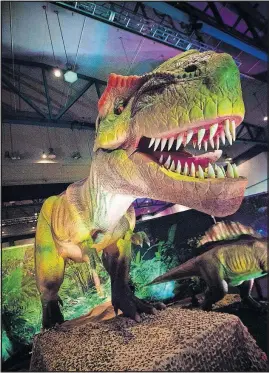  ?? [VSTAR ENTERTAINM­ENT] ?? A life-size Tyrannosau­rus rex from “Discover the Dinosaurs UNLEASHED” What: Where: Contact: Times: Admission: