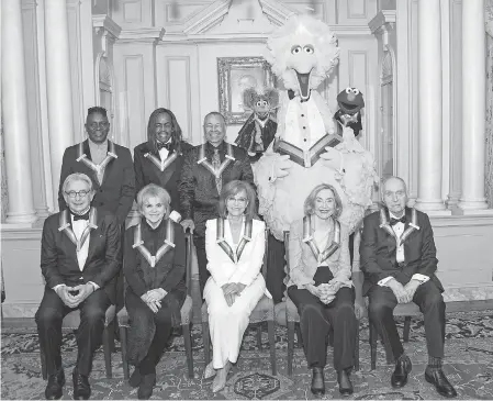  ?? RON SACHS/ POOL/ EPA- EFE ?? 2019 Kennedy Center Honorees on Dec. 7. From left to right, back row, Philip Bailey, Verdine White, Ralph Johnson, Abby, Big Bird and Elmo; front row, Michael Tilson Thomas, Linda Ronstadt, Sally Field and “Sesame Street” co- creators Joan Ganz Cooney and Dr. Lloyd Morrisett.