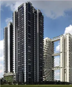  ?? SAMUEL ISAAC CHUA/THE EDGE SINGAPORE ?? A 1,141 sq ft unit at Sky Vue (left) was sold for $2.5 million on Dec 18, 2023, setting a new high of of $2,191 psf